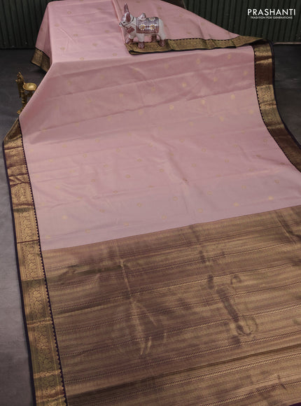 Semi kanchipuram silk saree pastel pink and deep purple with allover small zari checks & buttas and temple design zari woven border