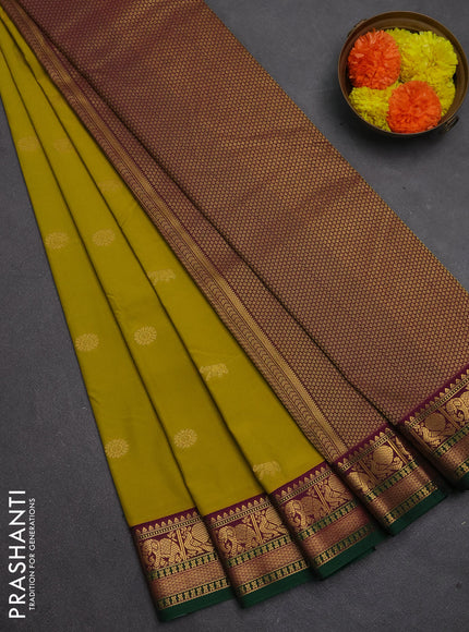 Semi kanchipuram silk saree mustard green and purple with zari woven buttas and temple design zari woven border