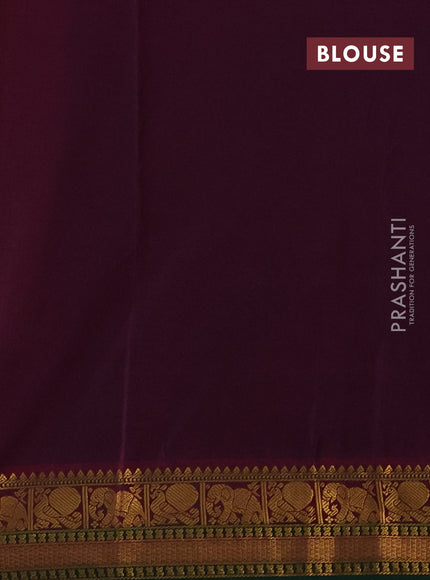 Semi kanchipuram silk saree dual shade of pinkish orange and purple with zari woven buttas and temple design zari woven border