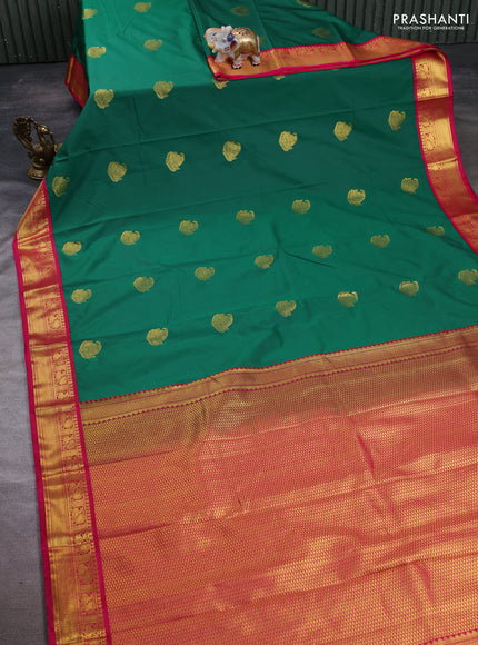 Semi kanchipuram silk saree green and pink with paisley zari woven buttas and zari woven korvai border