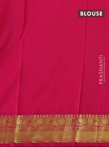 Semi kanchipuram silk saree green and pink with paisley zari woven buttas and zari woven korvai border