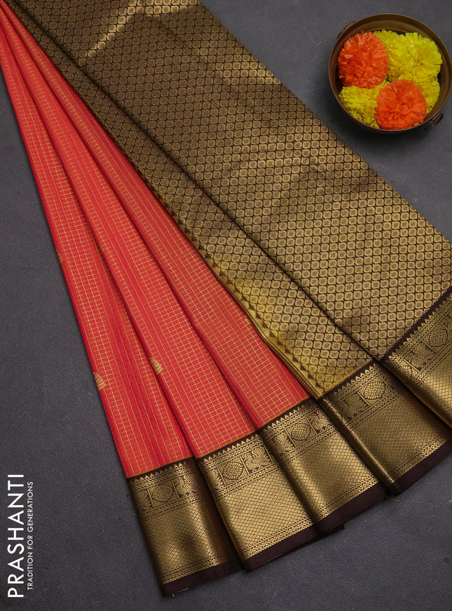 Semi kanchipuram silk saree dual shade of pinkish orange and coffee brown with allover small zari checks & buttas and zari woven korvai border