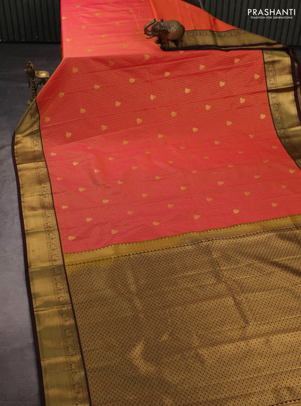 Semi kanchipuram silk saree dual shade of pinkish orange and coffee brown with allover small zari checks & buttas and zari woven korvai border