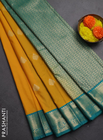 Semi kanchipuram silk saree mustard yellow and teal green with zari woven buttas and zari woven korvai border