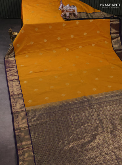 Semi kanchipuram silk saree mustard yellow and purple with zari woven buttas and zari woven korvai border