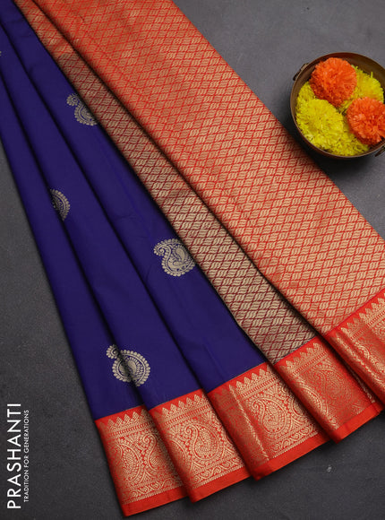 Semi kanchipuram silk saree navy blue and orange with paisley zari woven buttas and zari woven korvai border