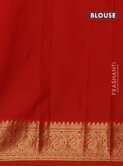 Semi kanchipuram silk saree navy blue and orange with paisley zari woven buttas and zari woven korvai border