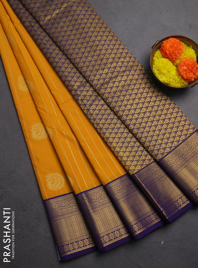 Semi kanchipuram silk saree mustard yellow and navy blue with allover zari stripes & buttas and zari woven korvai border