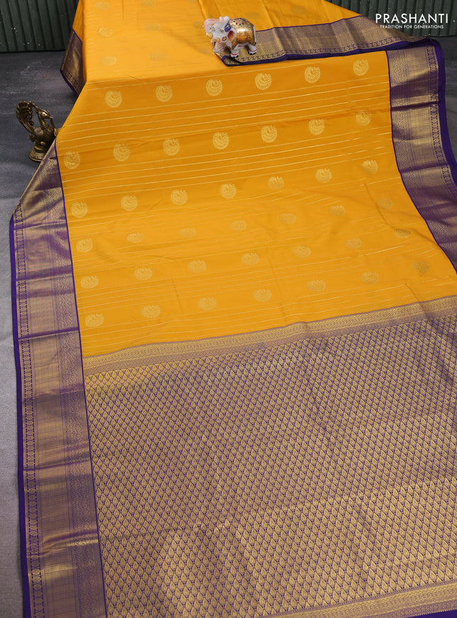 Semi kanchipuram silk saree mustard yellow and navy blue with allover zari stripes & buttas and zari woven korvai border