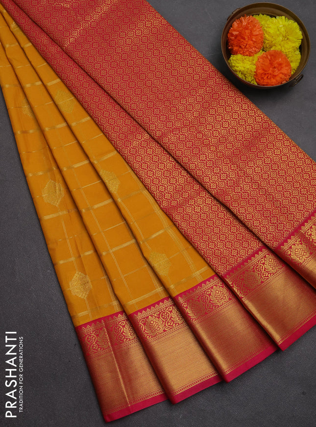 Semi kanchipuram silk saree yellow and pink with allover zari checks & buttas and temple design zari woven border