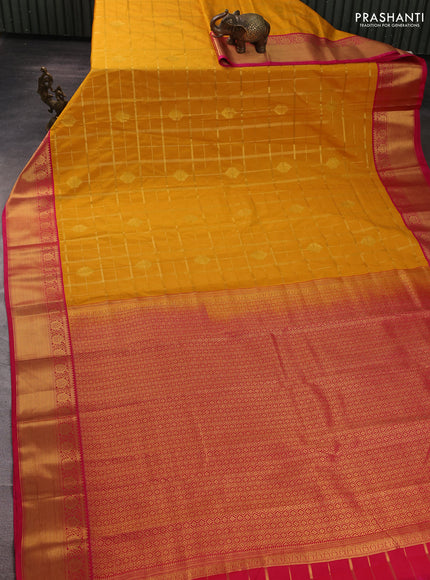 Semi kanchipuram silk saree yellow and pink with allover zari checks & buttas and temple design zari woven border