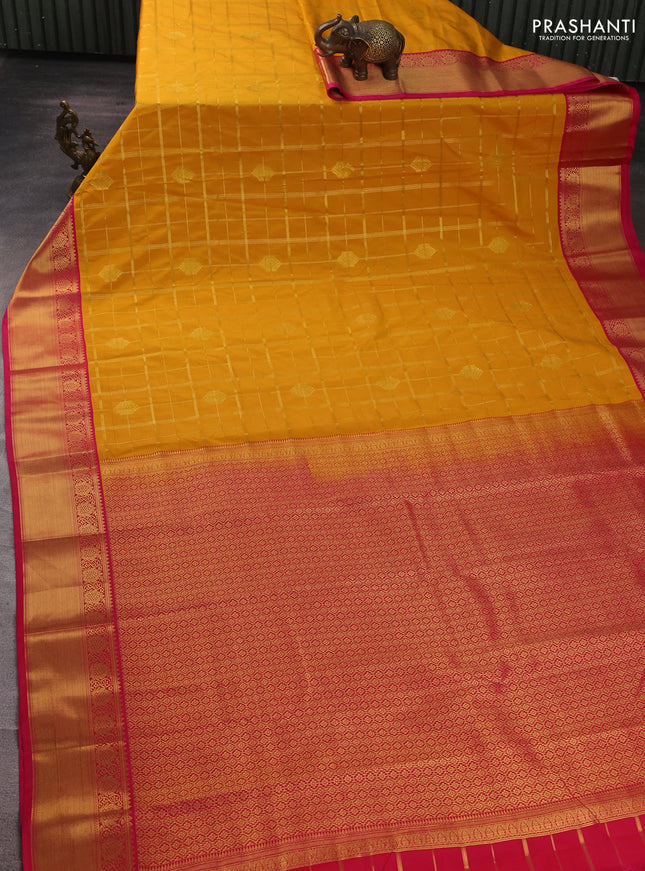Semi kanchipuram silk saree yellow and pink with allover zari checks & buttas and temple design zari woven border