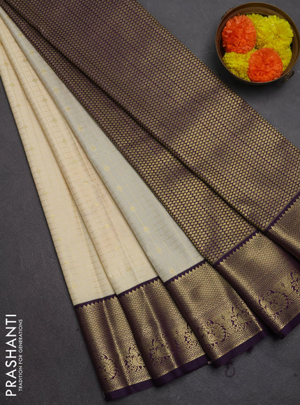 Semi kanchipuram silk saree beige and deep purple with allover zari checks & buttas and temple design zari woven border