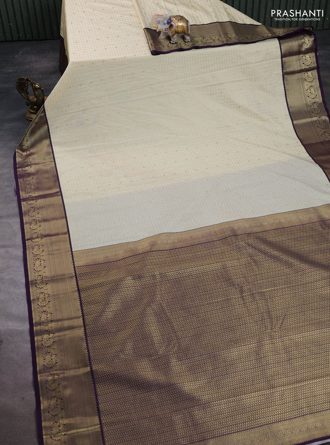 Semi kanchipuram silk saree beige and deep purple with allover zari checks & buttas and temple design zari woven border
