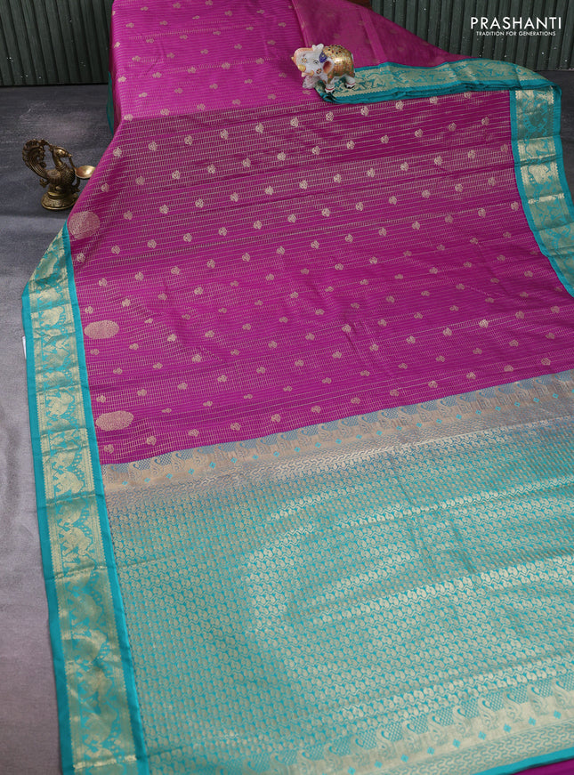 Semi kanchipuram silk saree purple and teal green with allover zari checks & buttas and zari woven border