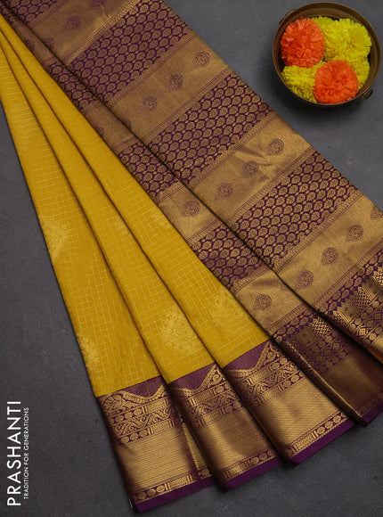 Semi kanchipuram silk saree yellow and purple with allover zari checks & buttas and zari woven border