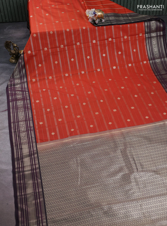 Semi kanchipuram silk saree rust shade and deep purple with allover zari weaves & buttas and zari woven border