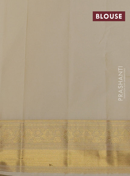 Semi kanchipuram silk saree beige with allover zari weaves & buttas and zari woven border
