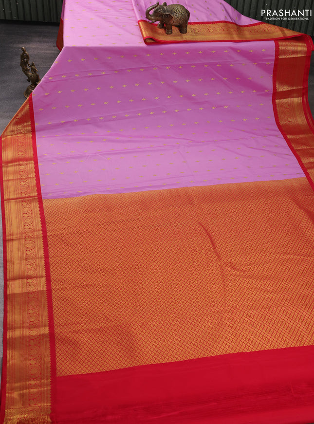 Semi kanchipuram silk saree lotus pink and red with allover zari woven buttas and temple design zari woven border