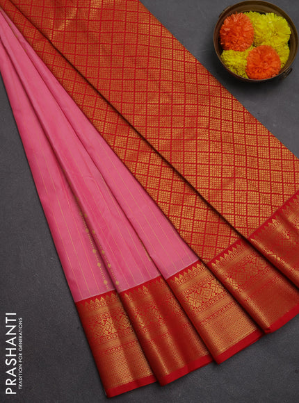 Semi kanchipuram silk saree peach pink and red with allover zari stripes & buttas and temple design zari woven border