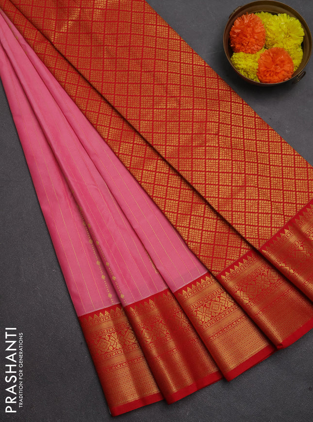 Semi kanchipuram silk saree peach pink and red with allover zari stripes & buttas and temple design zari woven border