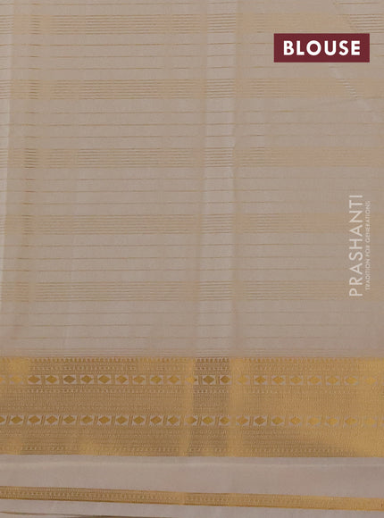 Semi kanchipuram silk saree cream with allover zari weaves & buttas and zari woven border