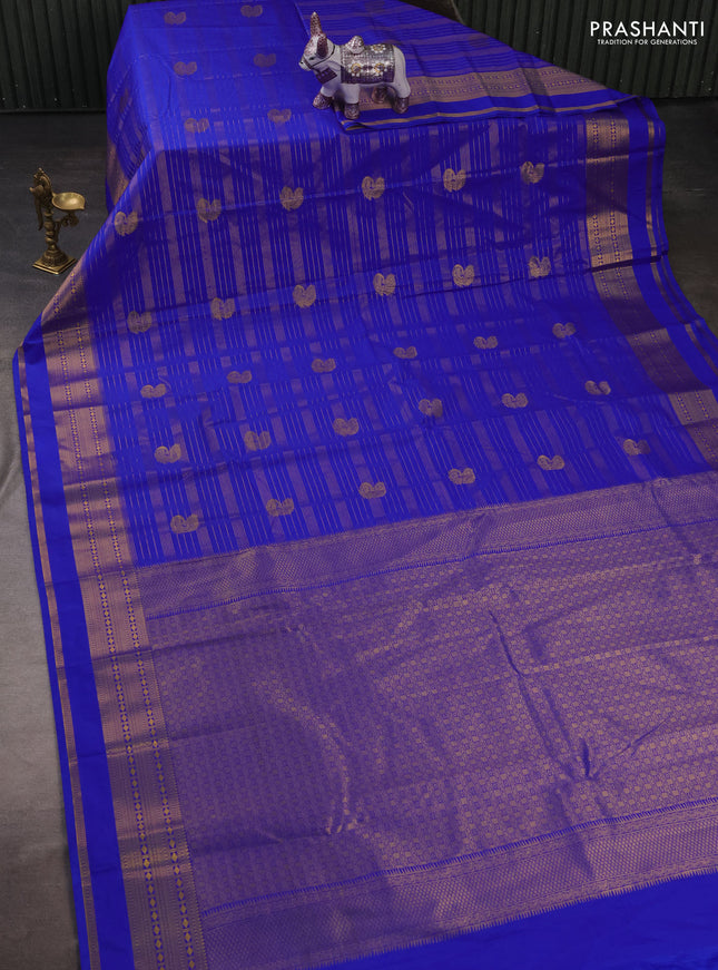 Semi kanchipuram silk saree royal blue with allover zari weaves & buttas and rettapet zari woven border