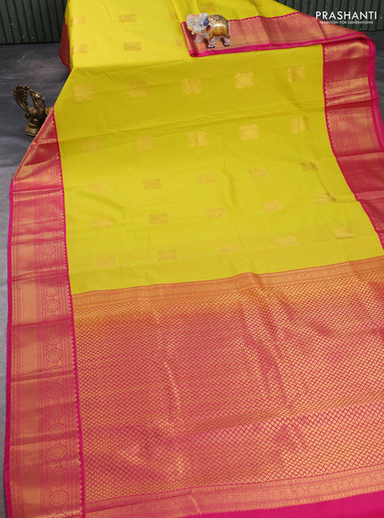 Semi kanchipuram silk saree lime yellow and pink with allover zari stripes & buttas and zari woven korvai border