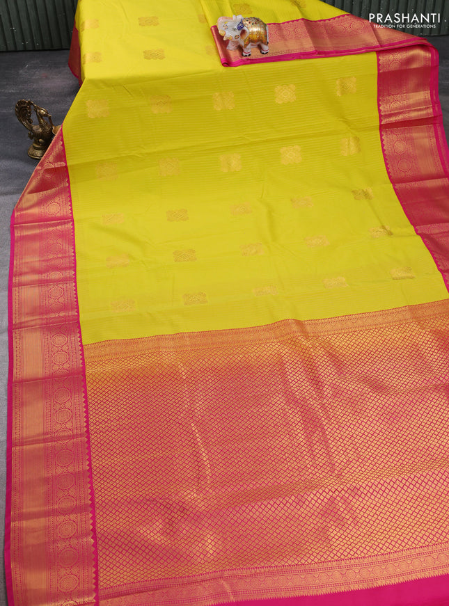 Semi kanchipuram silk saree lime yellow and pink with allover zari stripes & buttas and zari woven korvai border
