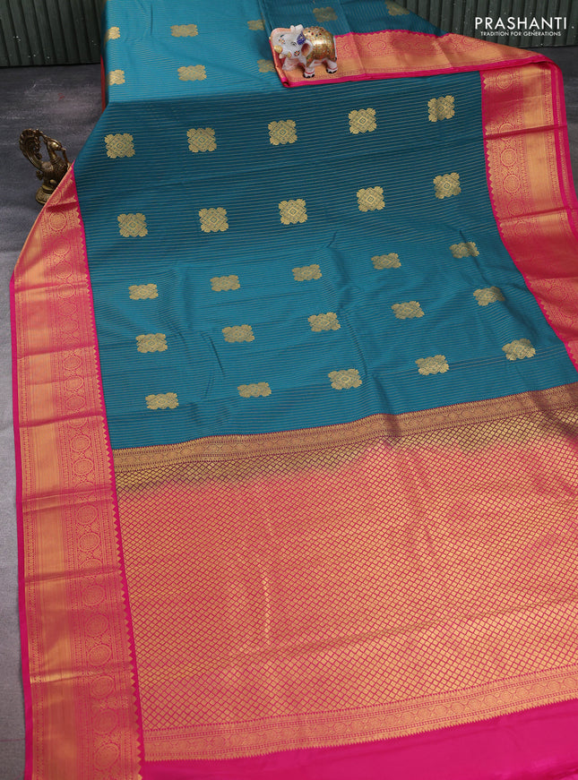 Semi kanchipuram silk saree peacock green and pink with allover zari stripes & buttas and zari woven korvai border