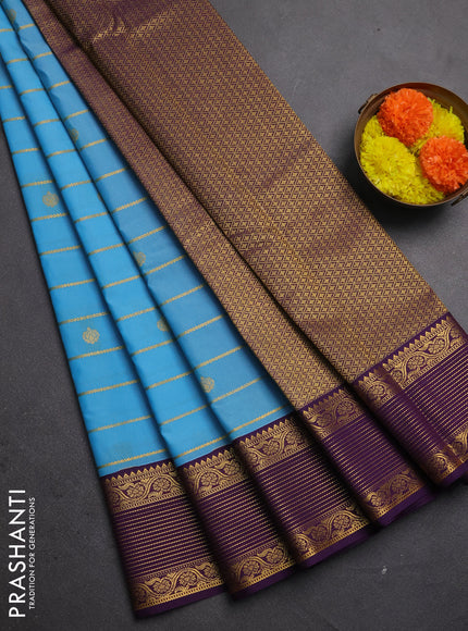 Semi kanchipuram silk saree teal blue and purple with allover small zari checks & buttas and zari woven border
