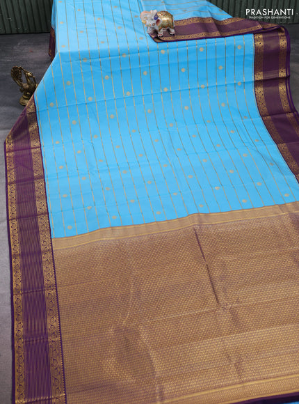 Semi kanchipuram silk saree teal blue and purple with allover small zari checks & buttas and zari woven border