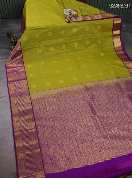 Semi kanchipuram silk saree mehendi green and purple with allover small zari checks & buttas and zari woven border