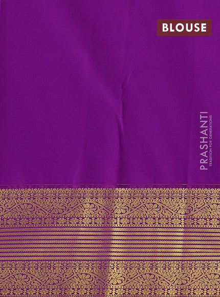 Semi kanchipuram silk saree green and purple with allover small zari checks & buttas and zari woven korvai border
