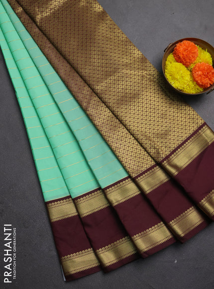 Semi kanchipuram silk saree teal green and deep maroon with allover zari weaves and rettapet zari woven korvai border