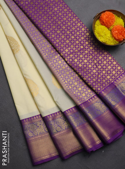 Semi kanchipuram silk saree off white and purple with zari woven buttas and zari woven korvai border