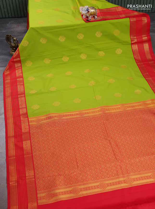 Semi kanchipuram silk saree lime green and red with zari woven buttas and temple design zari woven korvai border