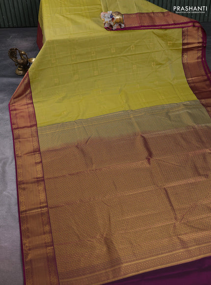 Semi kanchipuram silk saree mehendi green and magenta pink with allover zari checks & buttas and temple design zari woven korvai border