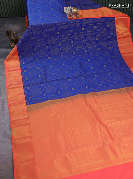 Semi kanchipuram silk saree blue and peach orange with allover zari checks & buttas and temple design zari woven korvai border