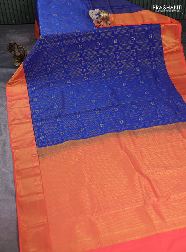 Semi kanchipuram silk saree blue and peach orange with allover zari checks & buttas and temple design zari woven korvai border