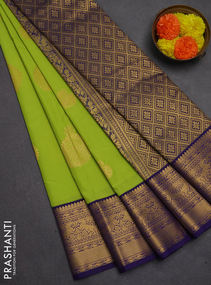 Semi kanchipuram silk saree fluorescent green and navy blue with zari woven buttas and zari woven border