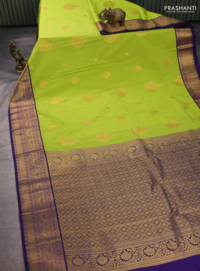 Semi kanchipuram silk saree fluorescent green and navy blue with zari woven buttas and zari woven border