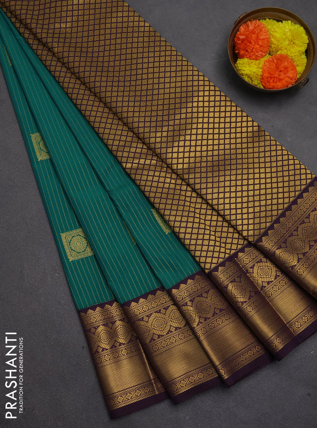 Semi kanchipuram silk saree green and deep purple with allover zari weaves & buttas and temple design zari woven border