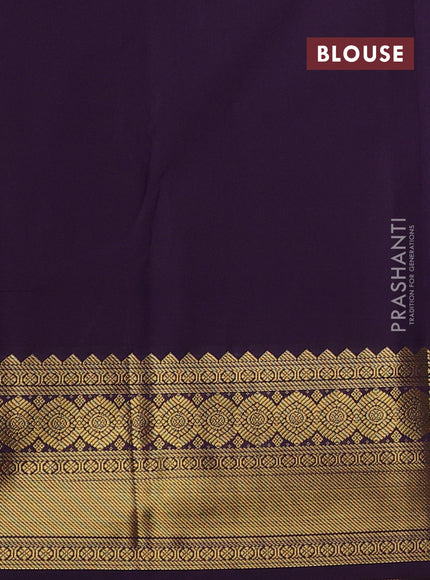 Semi kanchipuram silk saree green and deep purple with allover zari weaves & buttas and temple design zari woven border