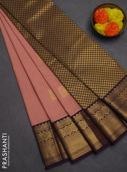 Semi kanchipuram silk saree peach pink and deep purple with allover zari weaves & buttas and temple design zari woven border