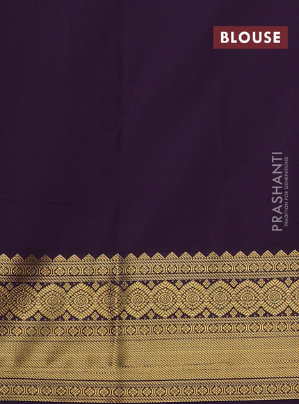 Semi kanchipuram silk saree peach pink and deep purple with allover zari weaves & buttas and temple design zari woven border