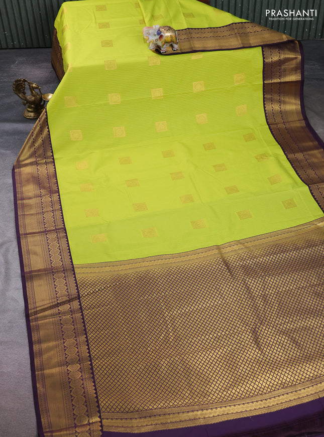 Semi kanchipuram silk saree fluorescent green and deep purple with allover zari weaves & buttas and temple design zari woven border
