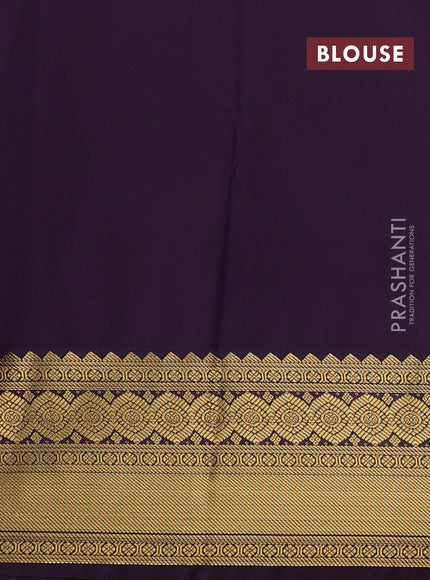 Semi kanchipuram silk saree fluorescent green and deep purple with allover zari weaves & buttas and temple design zari woven border