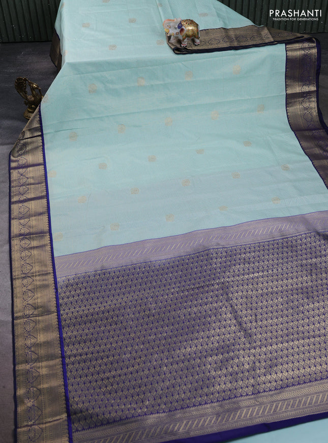 Semi kanchipuram silk saree mild teal and navy blue with allover small zari checks & buttas and zari woven korvai border