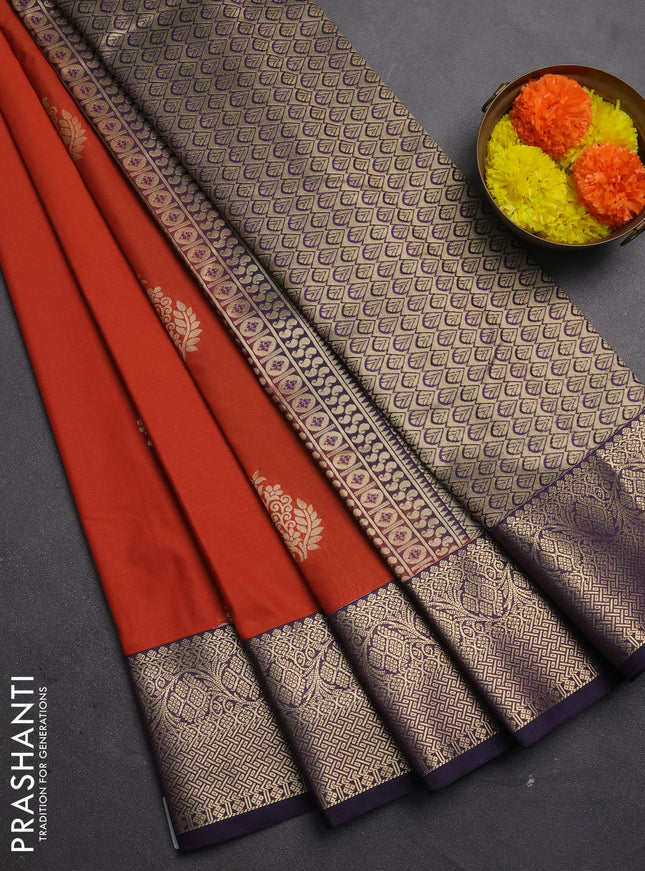 Semi kanchipuram silk saree rust shade and deep purple with zari woven buttas and zari woven border